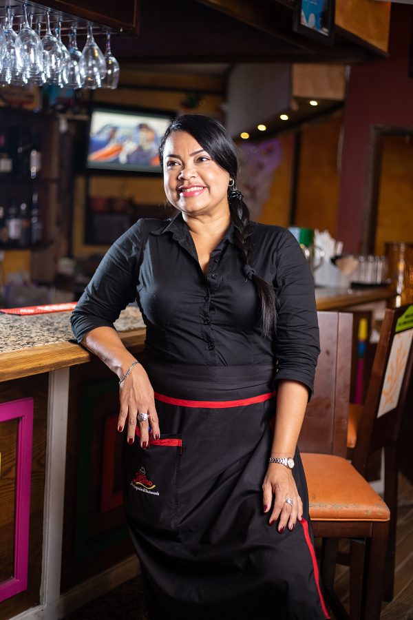 pretty waitress local food aruba colombia